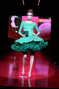 A model flaunts Betsey Johnson design at the 2009 Barbie fashion show.