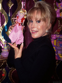 Barbara-Eden-Holding-A-Jeannie-Doll-i-dream-of-jeannieSMALL