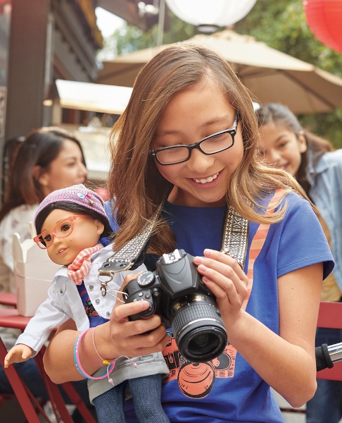 An aspiring stop-motion vlogger carries her Z doll.