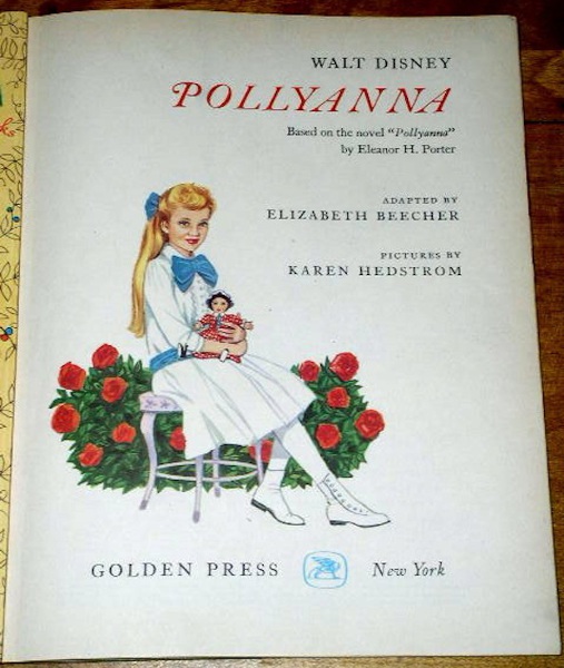 Pollyanna embracing the doll on the book’s title page.