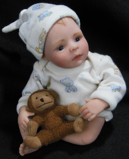 8-inch baby with monkey toy