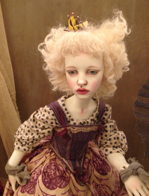 Antique creations reflect her past as a doll costume designer