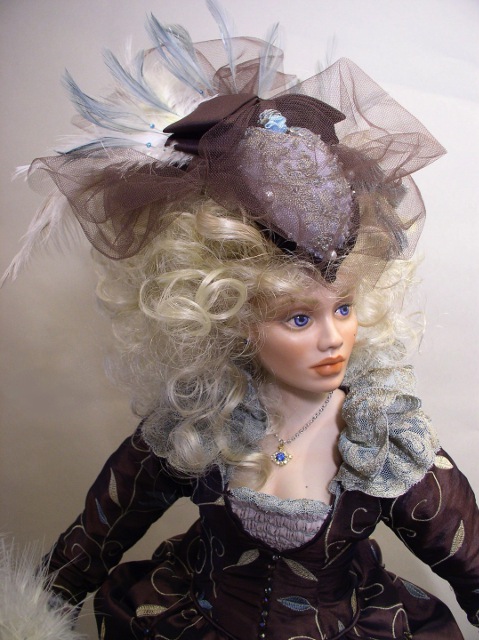 Close-up of Marie Antoinette doll’s face