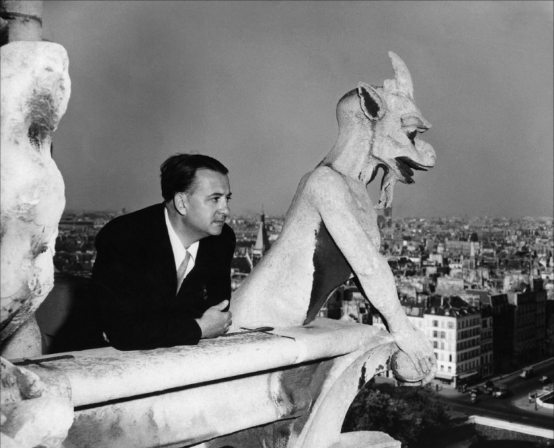 Director Jacques Tourneur, posing with Notre Dame’s gargoyles