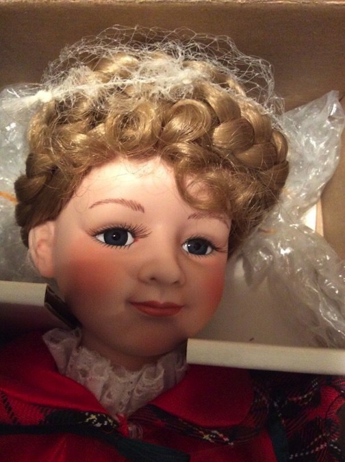 A close-up view of the sought-after Zuzu portrait doll