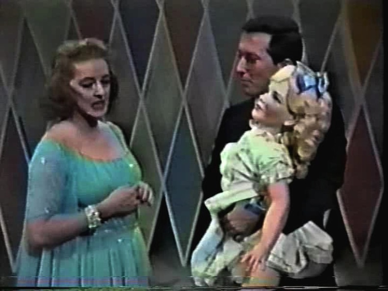 Bette Davis and Andy Williams and doll