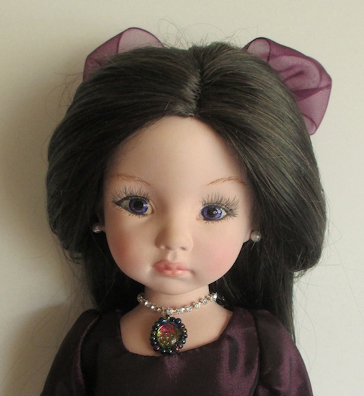 Face of Little Darling in Violet doll