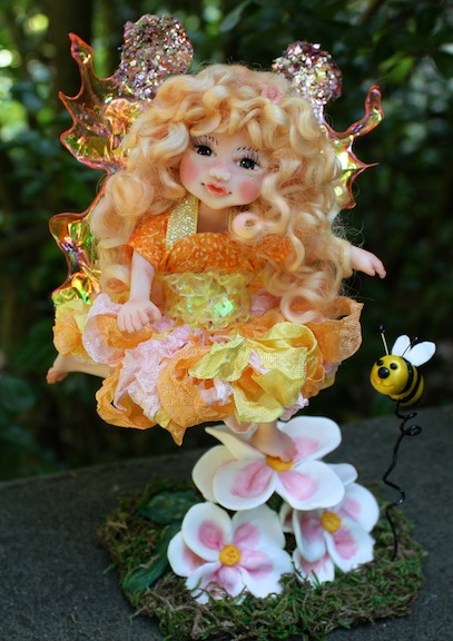 Whimsy is the perfect name for this fairy creation. She epitomizes what the artist dreams up and designs.