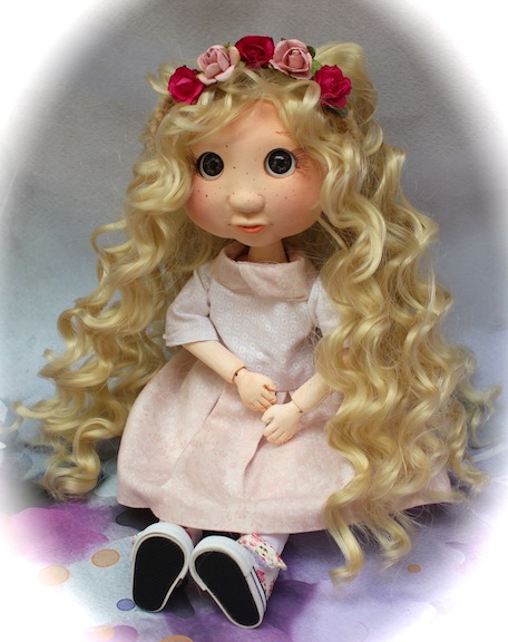 Lulu has many different looks: an assortment of wigs, clothing, and facial detailing.