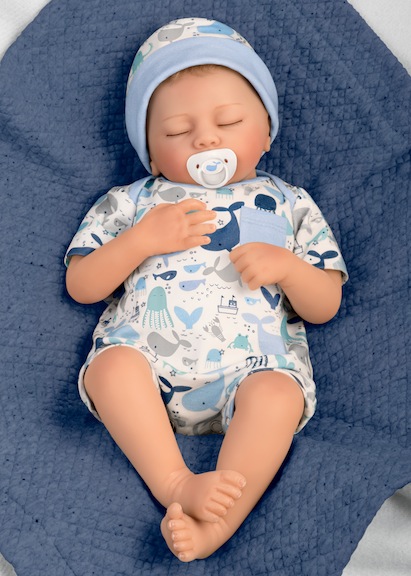 Seaside Dreams Baby Doll may grow up to be an ocean explorer. Scuba diving could be in his future. After all, Ashton-Drake has given him breathing capabilities!