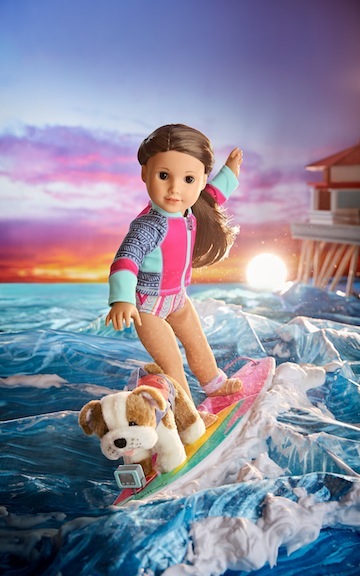 Joss makes a splash with her plush pal, Murph the Surf Dog, able to be collected, too.
