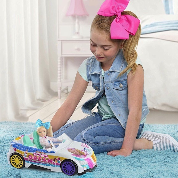 From head to toe, this JoJo wannabe is decked out like her favorite TV and YouTube star. Accessories, clothing, dolls, and toy cars — everything is coming up JoJo!