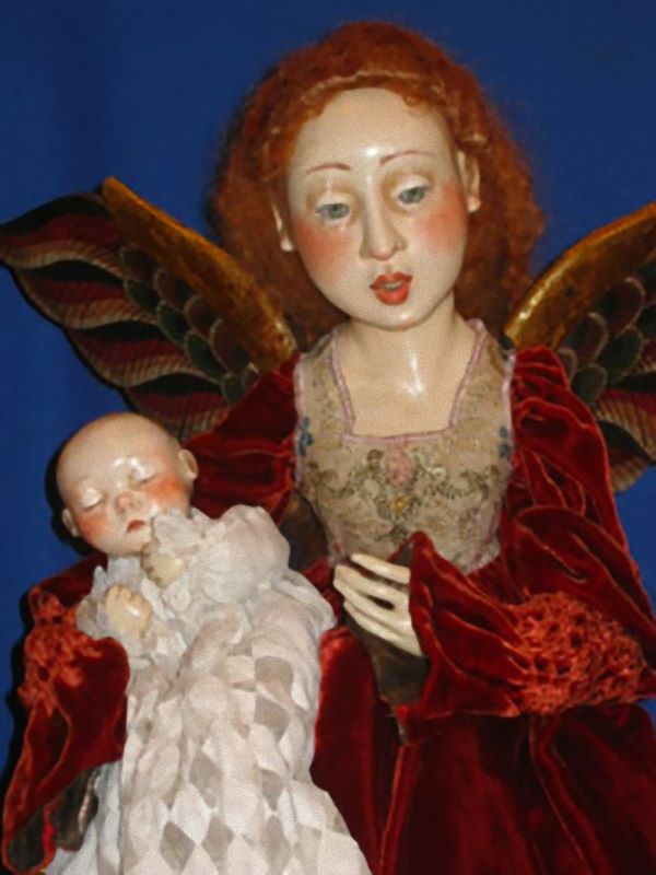 Angel with Baby, a wax-over-porcelain OOAK by Lucia and Judith Friedericy.