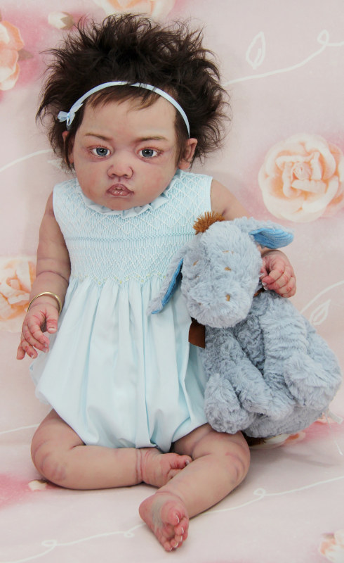 Lacee is Miller-Sands’ new platinum-silicone toddler, scheduled to be released in a limited edition of three dolls, each of which has her own wardrobe, a plush animal, and accessories.