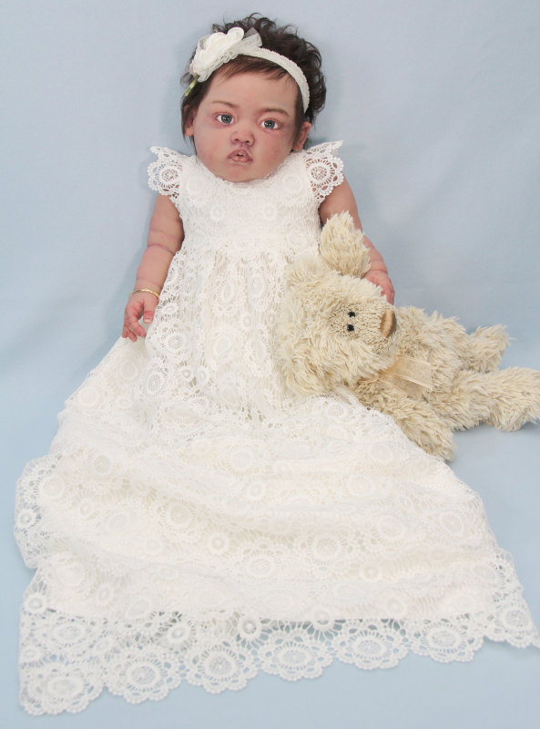 Lacee in her christening gown.