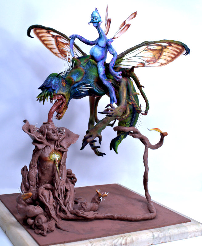 Monster Humming Bud Dragon is part of Allison’s This Bud is 4 U series. The 15-by-15-inch hand-painted clay sculpture, released in 2019, has handmade wings and is presented in a handmade display case.