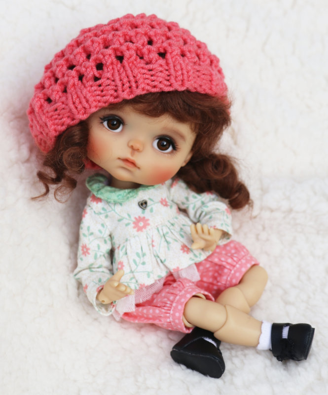 Fabbi is a 20 cm BJD cast in sunkissed resin on Meadow Dolls’ Chibbi body. She’s available exclusively from DOLLS magazine.