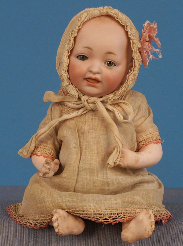 JDK-marked Kestner 11-inch character baby with solid dome head, original Kestner composition baby body, and factory chemise, panties, and bonnet. Photo courtesy of Foulke Archives