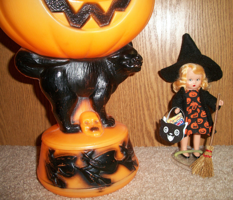 Beverly Hart: “My vintage Nancy Ann Storybook doll is dressed for Halloween complete with her pumpkin dress, witch hat, and broom. She has already scored some candy in her treat-or-treat bag. Happy Halloween, everyone! “