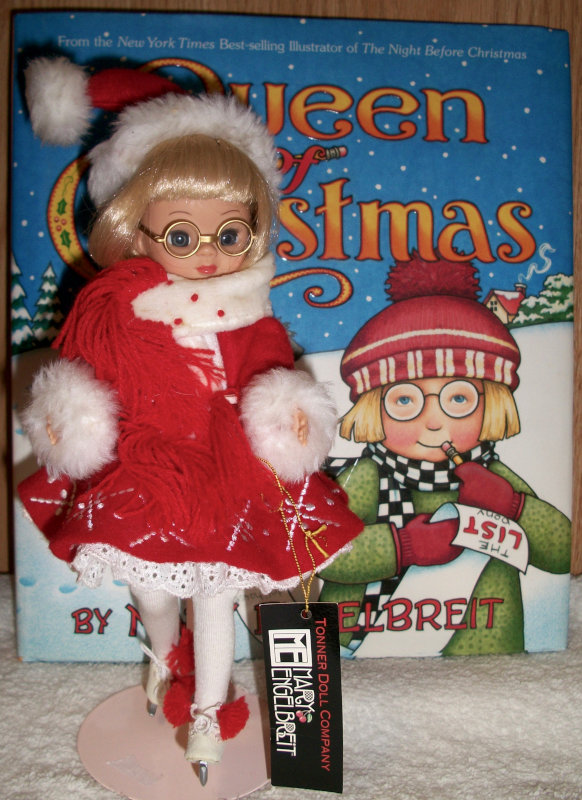 Beverly Hart: “This Tonner Tiny Estelle is all dressed to go on a Christmas skate before settling in to read Queen Christmas by Mary Englebreit.”