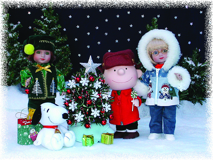 Janis Kiker: “Ann Estelle and Sophie share a Silent Night with Charlie Brown and Snoopy by the Alexander Doll Co.”