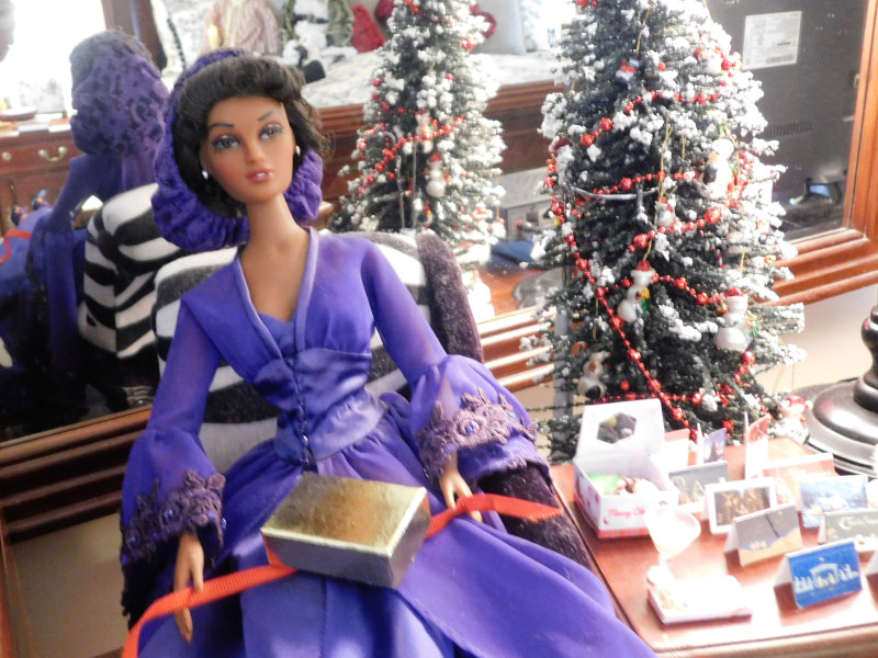 Jacquelyn Graham-Dickson: “Violet Waters from Tonner Dolls wrapping gifts.”