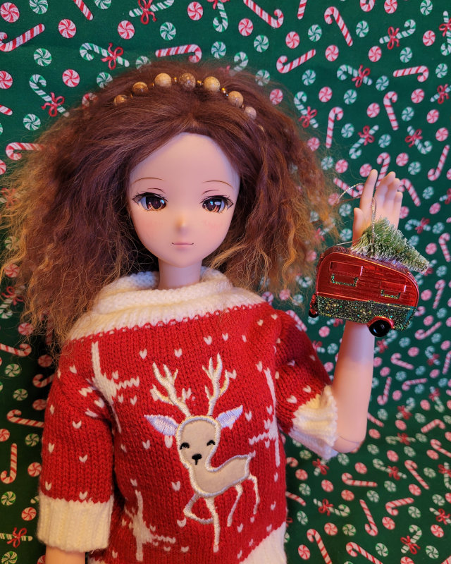 Jane Easterly: “Smart Doll Freedom wears an ugly sweater meant for a wine bottle from Aldi.”