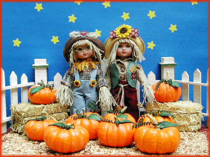 Janis Kiker: “Scarecrows Ann Estelle and Sophie by Tonner Co. are waiting in the Pumpkin Patch for the Great Pumpkin.”
