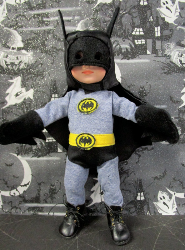 Linda Dryer: “My 10-inch Tonner Michael doll modeling the Batman costume I made for him from my own pattern and design.”
