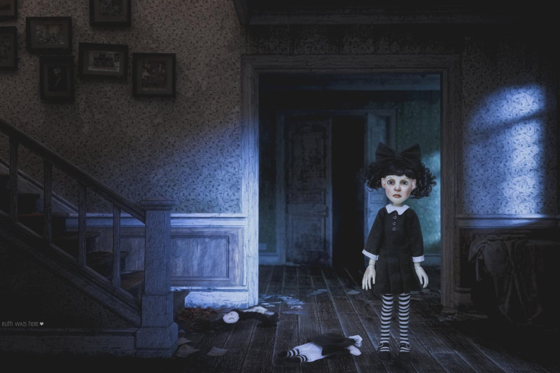 MaryJane Killinger: “Little Ruth (dressed as Wednesday Addams) by Connie Lowe has found herself in an abandoned house, accompanied by her headless but cute doll.”