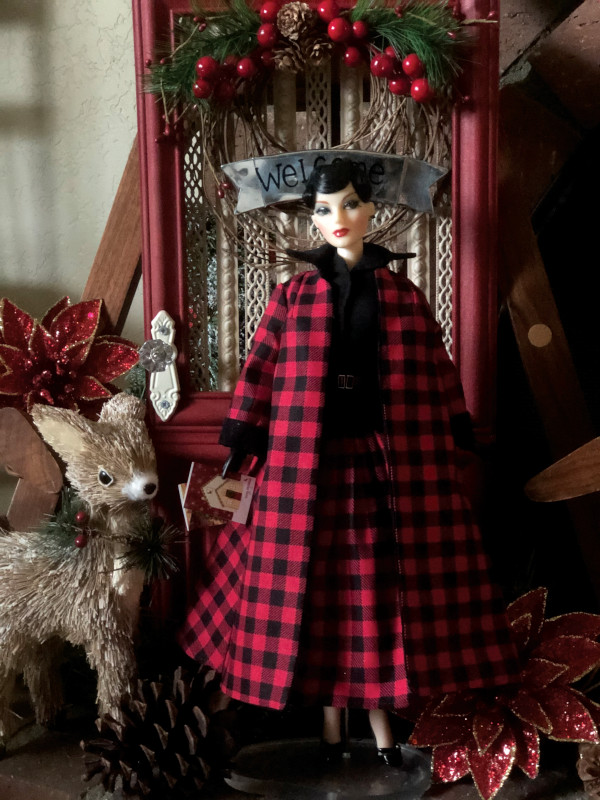 Suzanne McDonough: “JAMIEshow Madra (from the Gene collection) is ready for Christmas in her classic Buffalo plaid fashion.”
