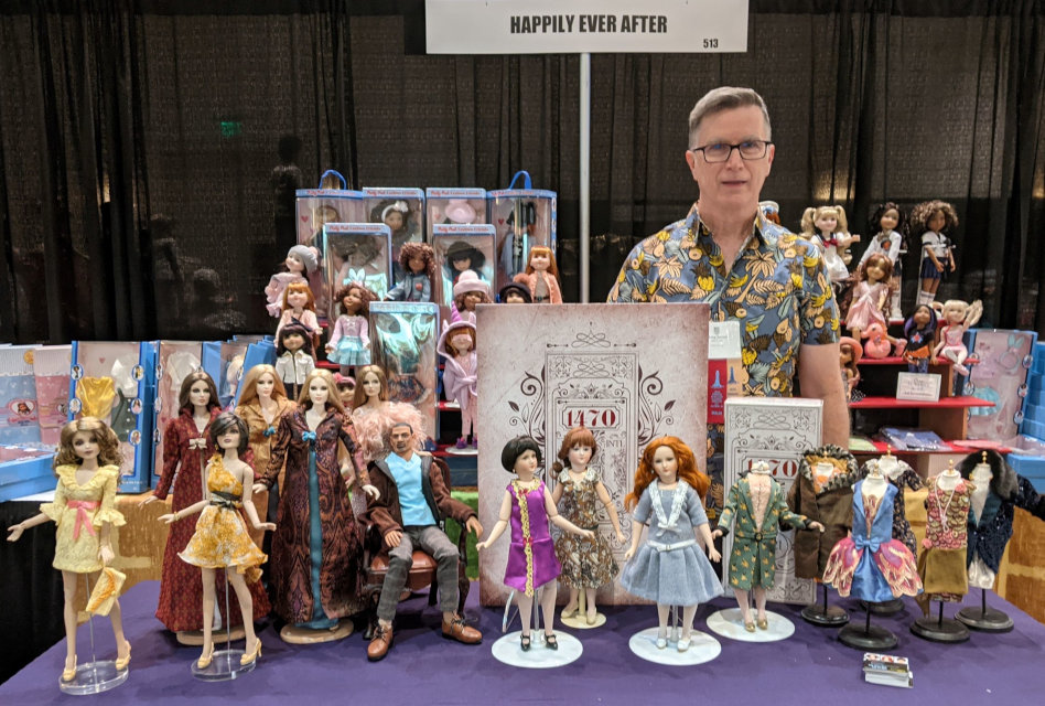 Doug James shows off his 1470 Collection and other creations at the Happily Ever After booth at the 2021 United Federation of Doll Clubs Convention.