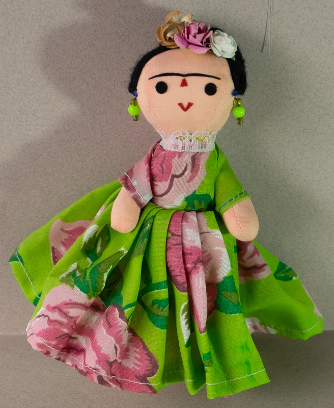 This little girl with the one eyebrow and flowers in her hair is, of course, Frida Kahlo. We visited the Frida Kahlo Museum in Mexico City. She owned a beautiful little cabinet of miniature furniture and dolls, but they don’t photograph well through glass.