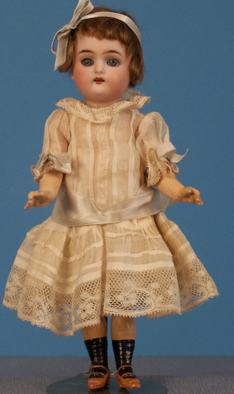 This all-factory-original Kammer & Reinhardt doll from the 1920s stands about 9 inches tall.