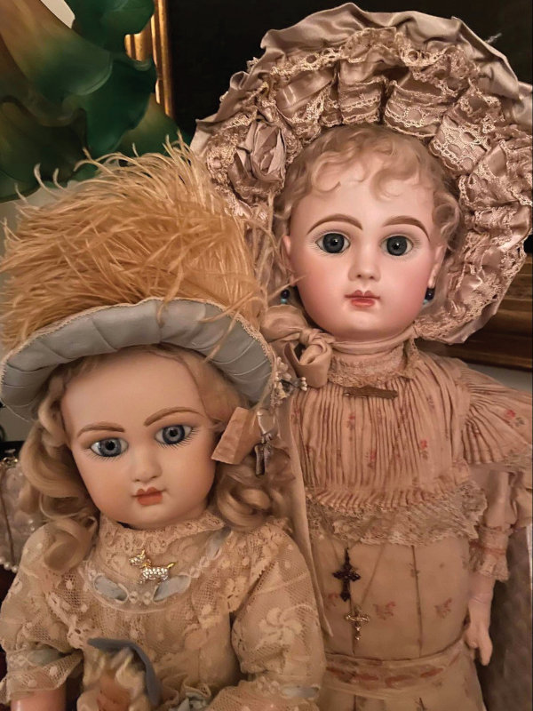 Two antique porcelain dolls.