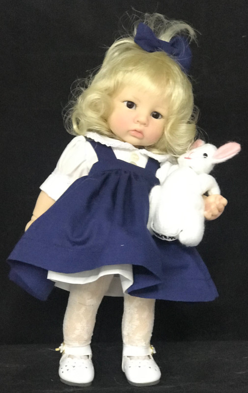 “Lex is named after a very special girl that I have watched grow up,” the artist said. The resin toddler doll has handmade glass eyes and carries a handmade stuffed bunny.