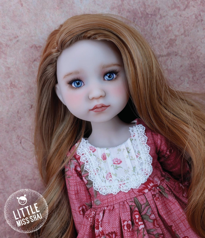 Talia is a repainted 15-inch Ruby Red Fashion Friends limited-edition Luca doll. Her gray-blue eyes are completely hand-painted. Her wig has long soft locks with subtle highlights.