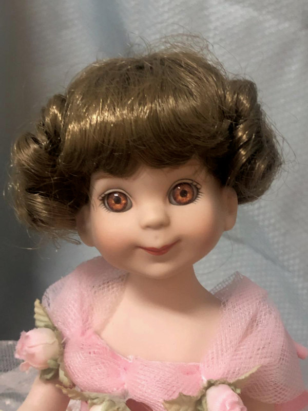 A closeup of Tonner's commemorative Betsy McCall doll.