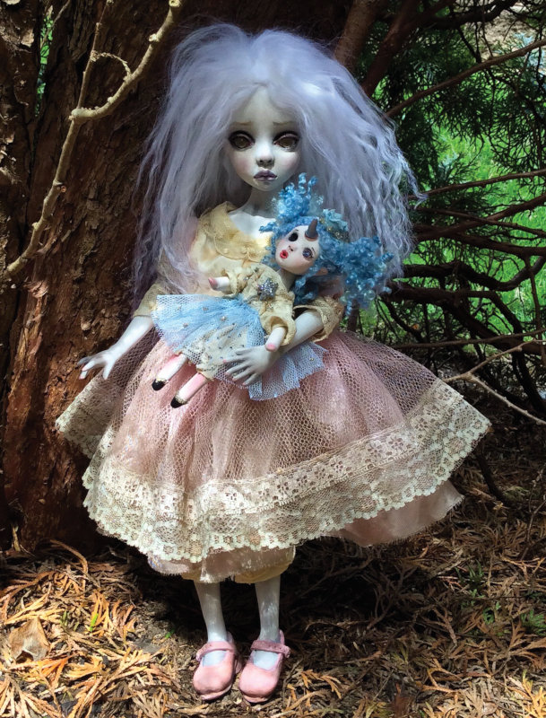 Mazzie’s Favorite Doll, 14 inches. “This doll was created for Penumbra Gallery in Portugal for their show Entity. I wanted to show another one of my lost little ghosts, who still carries her favorite little odd doll with a unicorn horn.”