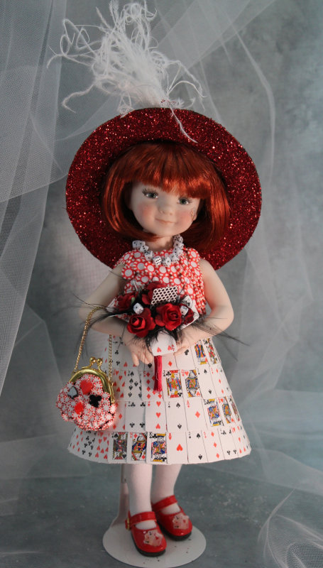 A limited edition of four dolls, Lucky wears a skirt made from more than 200 playing cards. Her bodice boasts 75 poker chips. Mize painstakingly created all of her chance-themed trinkets and accessories.