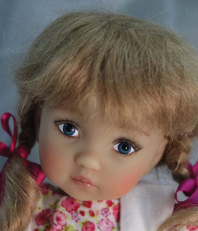 Mallory is a repaint of a 1-inch vinyl Tuesday’s Child doll from Boneka, designed by Dianna Effner. “My gratitude toward Dianna Effner is never-ending,” Mize said. “I have always admired her work and was devastated to learn of her death. Her dolls convey a charm and childhood innocence like no other doll artist.”