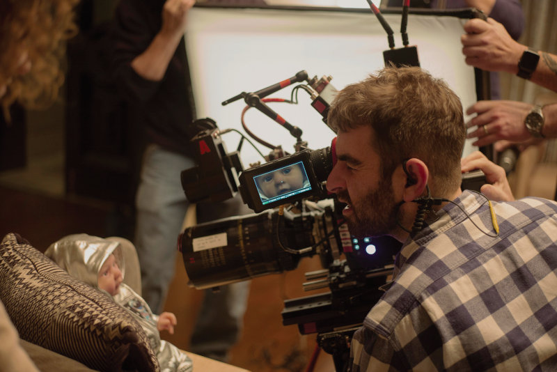 Director of photography Mike Gioulakis captures a close-up of the Jericho doll, dressed in a space suit costume, while filming season 2 of Servant. Photo by Jessica Kourkounis