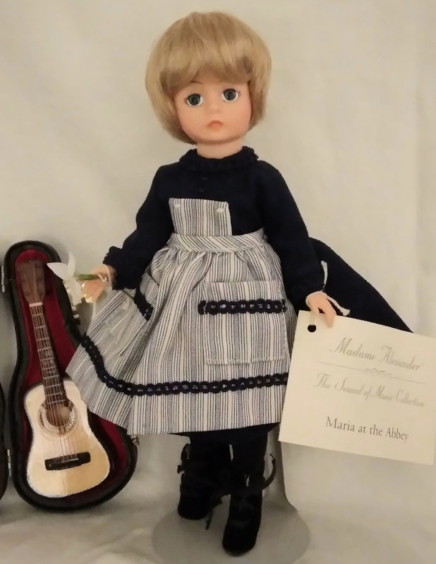 Maria at the Abbey, complete with guitar, was a hard-to-find doll from the 1993 set only.