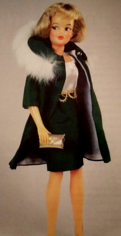 A redesigned Tammy doll in a dress and jacket with faux-fur trimmed hood.