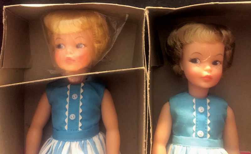 Closeup of two versions of Ideal's Pepper doll.