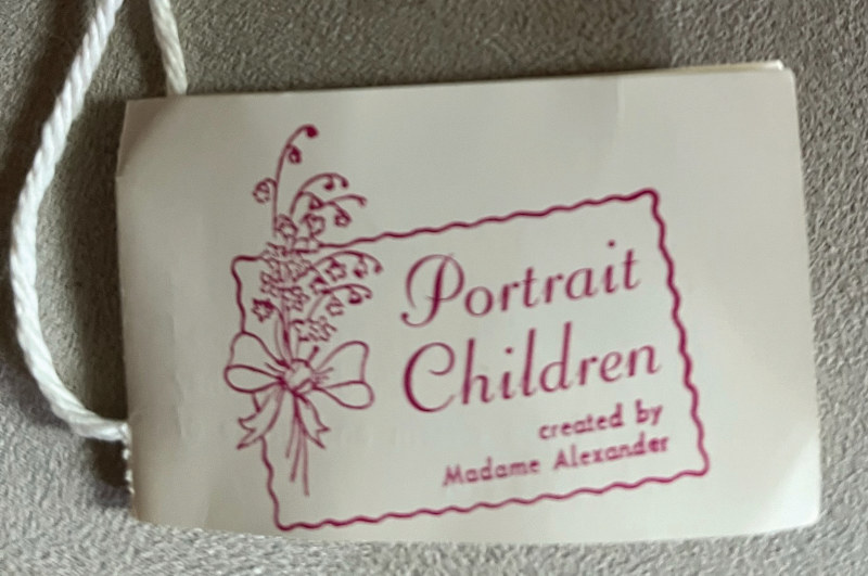 Tag reading “Portrait Children created by Madame Alexander”