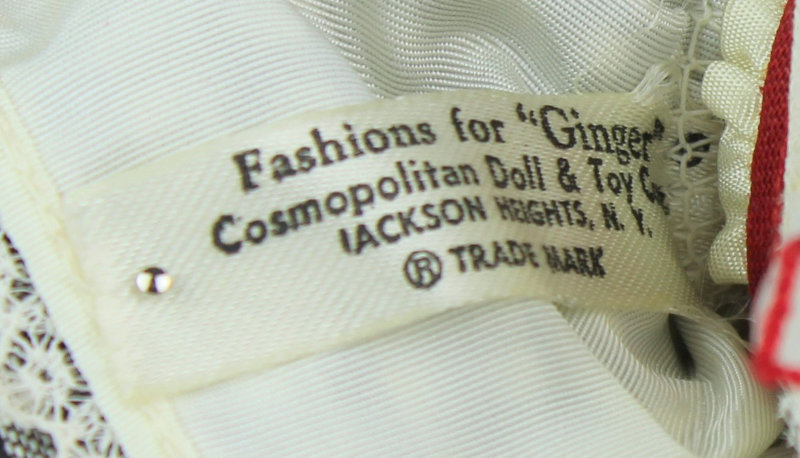 Clothing tag reads "Fashions for 'Ginger' Cosmopolitan Doll & Toy Co., Jackson Heights, N.Y."