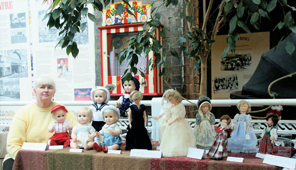 British author Susan Brewer displays her vinyl Nisbet dolls at an exhibition in 2003. Photo courtesy of Susan Brewer
