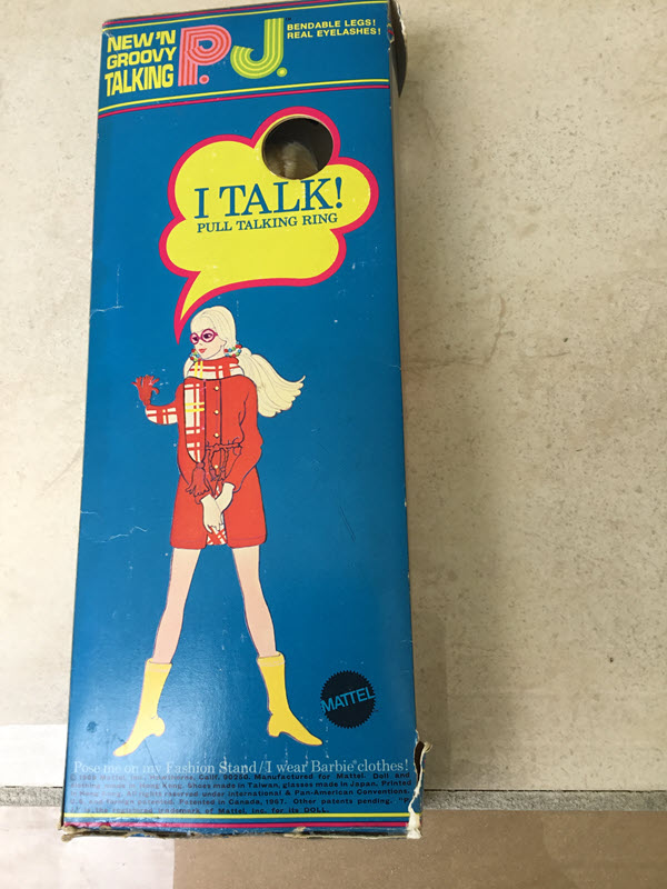 The back of Talking P.J.'s box, showing her red outfit, scarf, and yellow boots